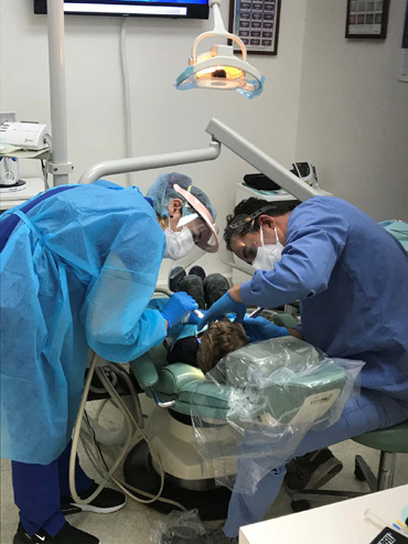 Patient having teeth cleaned